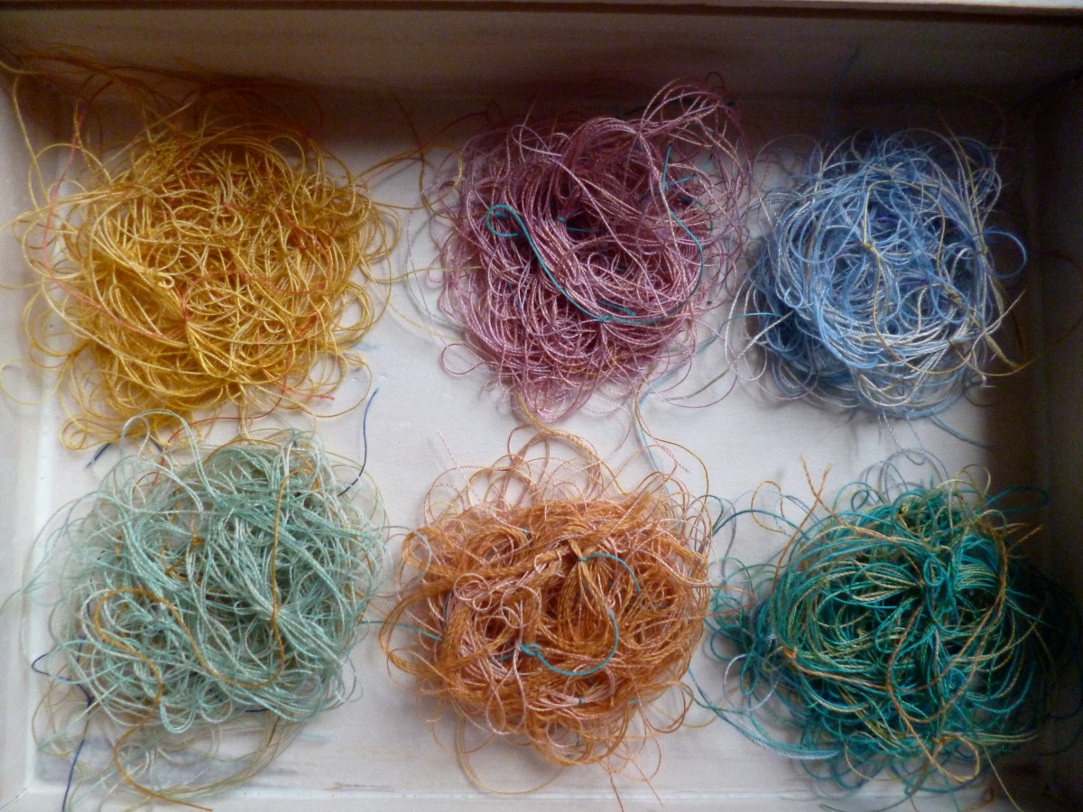I made hundreds of these hand knotted vintage thread bunches for String Theory
